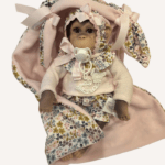 muñeca mono rosa