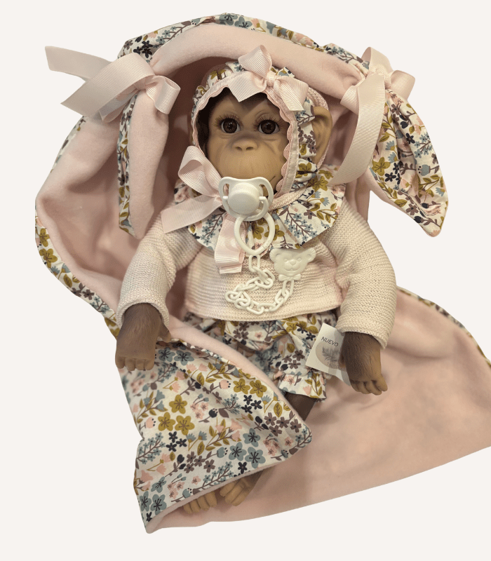 muñeca mono rosa